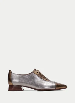 Sapatos rasos dali ouro-aço